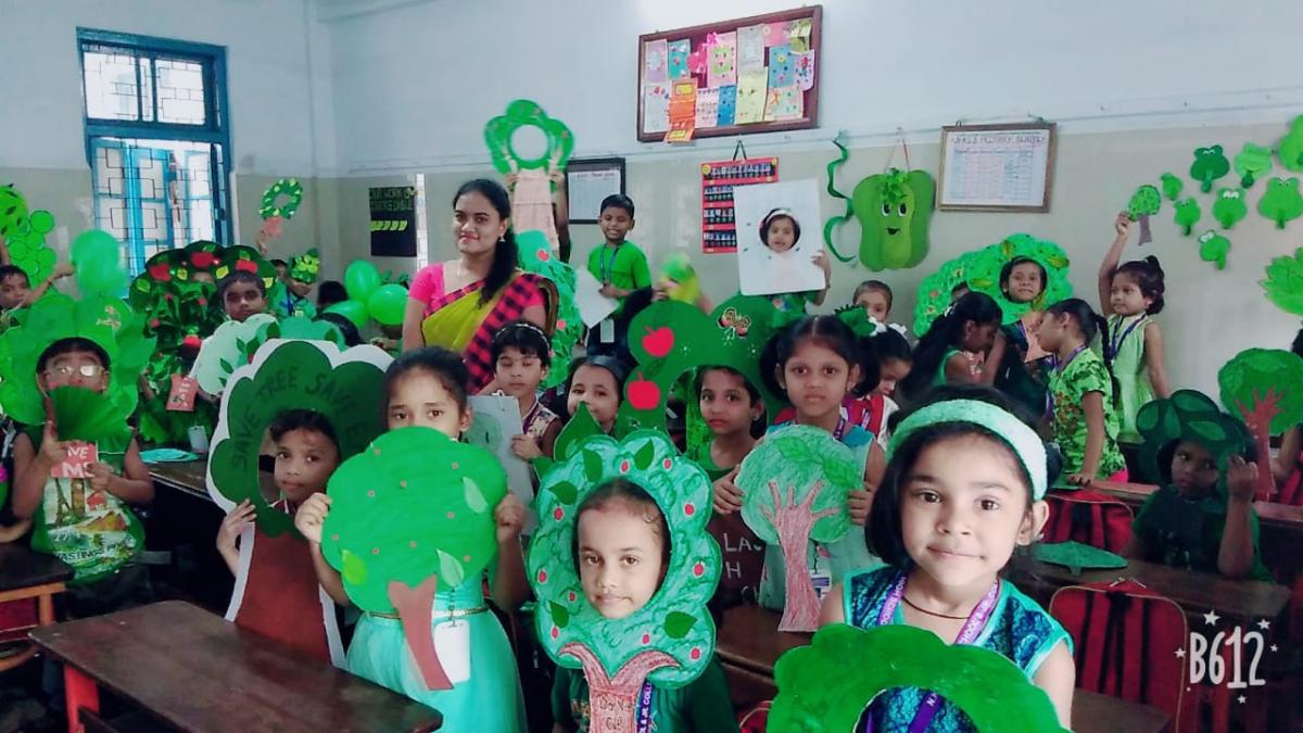 Parrot green day celebration by NKES primary school National Kannada